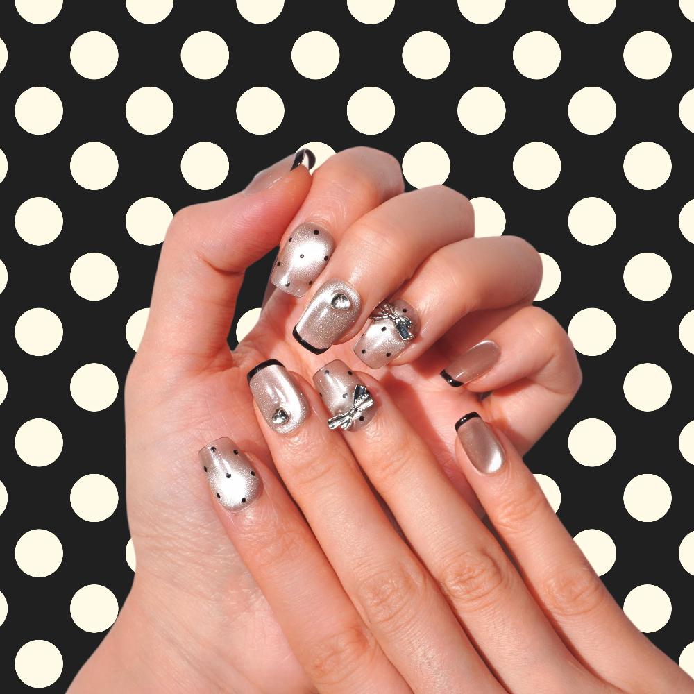 grey cat eye with polka dot and bow nail art-she her aura