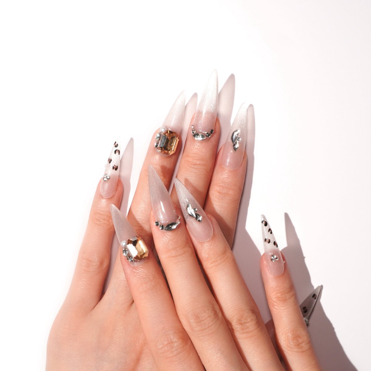 translucent grey french tips with leopard print press on nail-sheheraura
